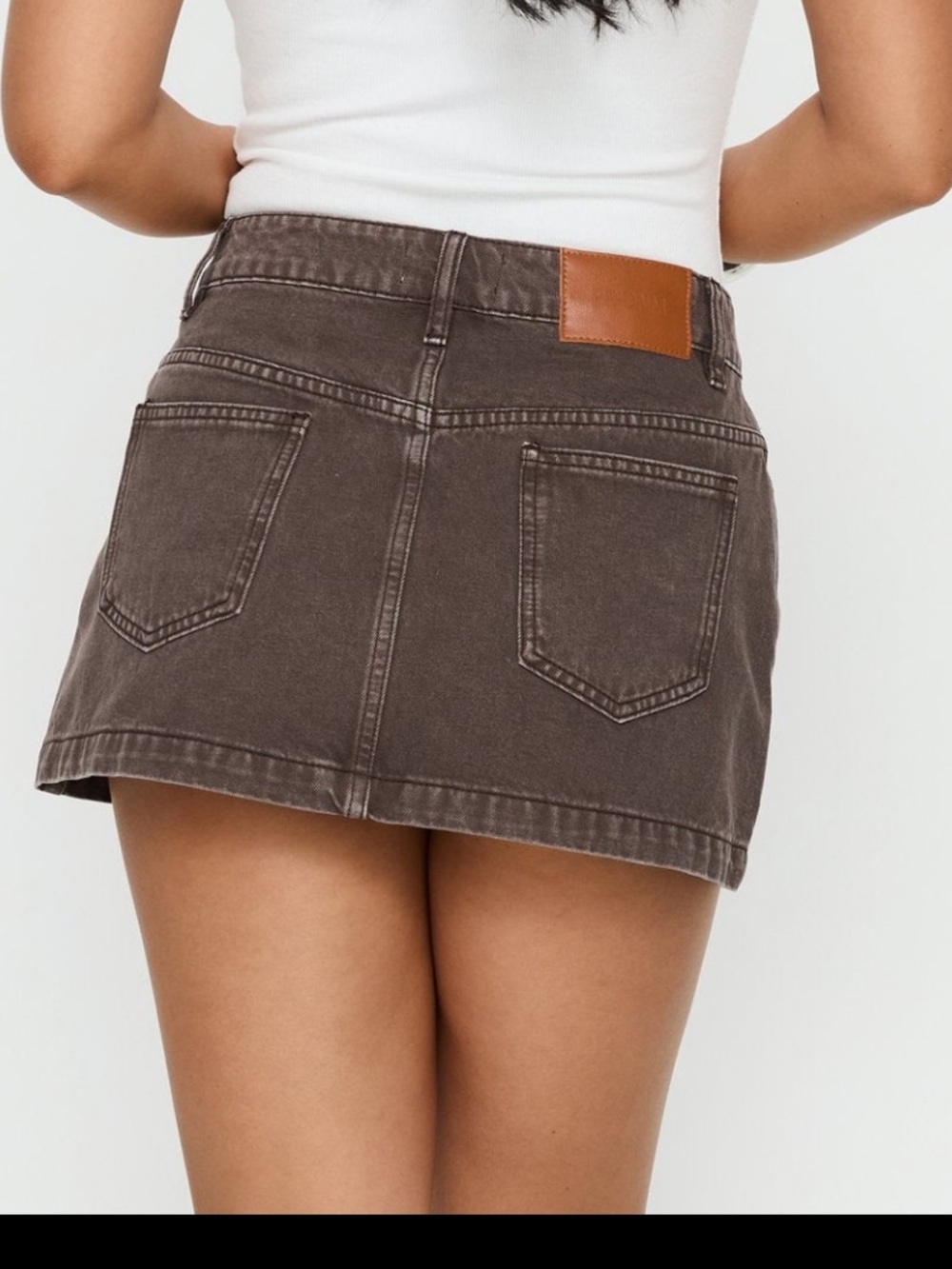 Nicolina Low Rise Denim Mini Skirt Washed
Brown from Princess Polly - Picture 2 of 5